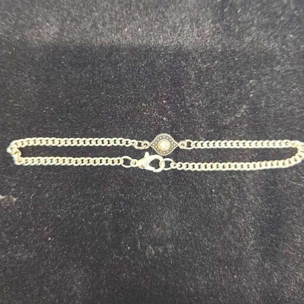 Evil Eye handcrafted bracelet, silver in color, with clear crystal stone, 8.5 "